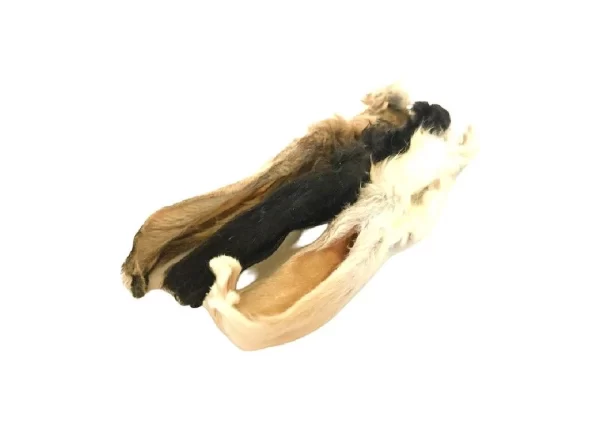 Image of furry rabbit ears dog treat: natural, stimulating chew, promoting dental health and providing protein-rich satisfaction for dogs.